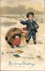 Tuck Christmas Boy and Girl in Snowball Fight Vintage Clothing c1910 Postcard