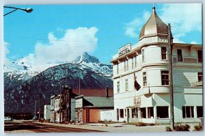 Skagway Alaska AK Postcard Golden North Hotel Exterior Roadside c1960s Mountains
