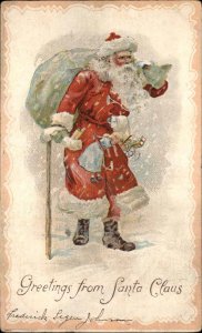 Christmas Santa Claus Toy Sack Walking Stick Snow Storm c1900s-20s Postcard