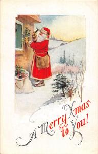F5/ Santa Claus Merry Christmas Holiday Postcard c1910 Wreath Home Snow 22