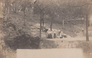 RPPC UMBRELLA PEOPLE VIEW OF FLORIDA REAL PHOTO POSTCARD (c.1905)