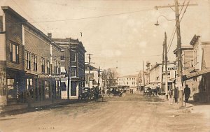 Springvale ME Dirt Street Storefronts Barber Shop Horse & Wagons, RPPC