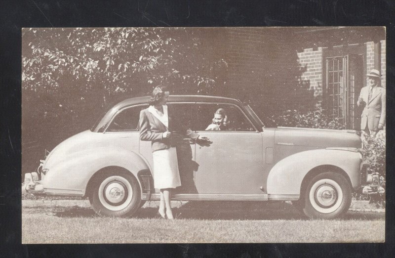 1946 STUDEBAKER CHAMPION 4 DOOR SEDAN VINTAGE CAR DEALER ADVERTISING POSTCARD