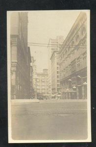 RPPC KANSAS CITY MISSOURI DOWNTOWN STREET SCENE REAL PHOTO POSTCARD MO..