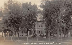 Storm Lake Iowa~Court House Square~Stores in Distance~Lots of Trees~1923 RPPC