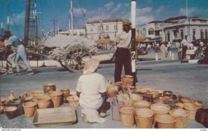 BARBADOS, B.W.I., 1950-60s; Pottery seller at BRIDGETOWN waterfront