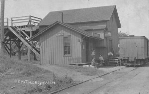 DS1/ Corey Michigan RPPC Postcard c1910 Railroad Depot Station Men  43