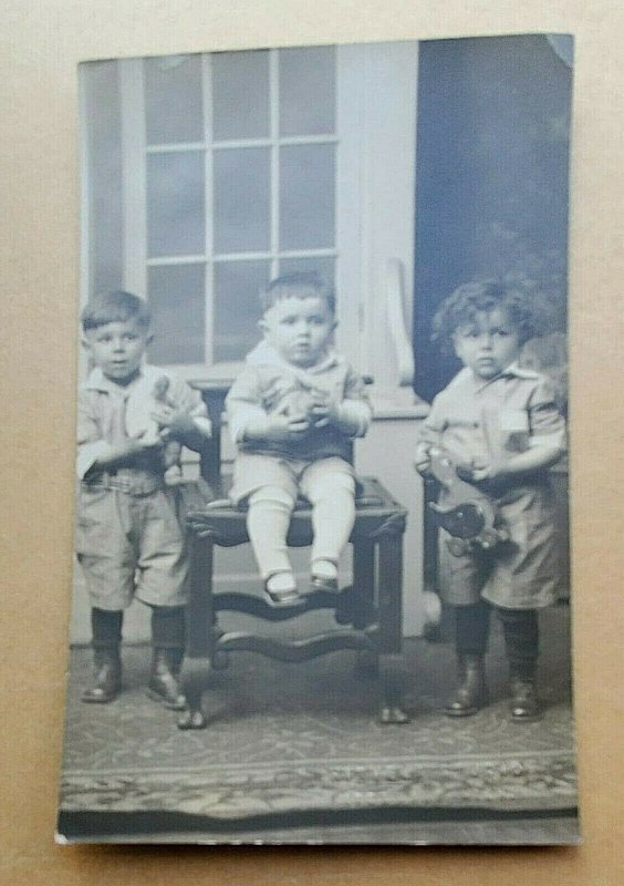 1926 RPPC Postcard Boys Holding American Primitive Wooden Duck Pull Toys