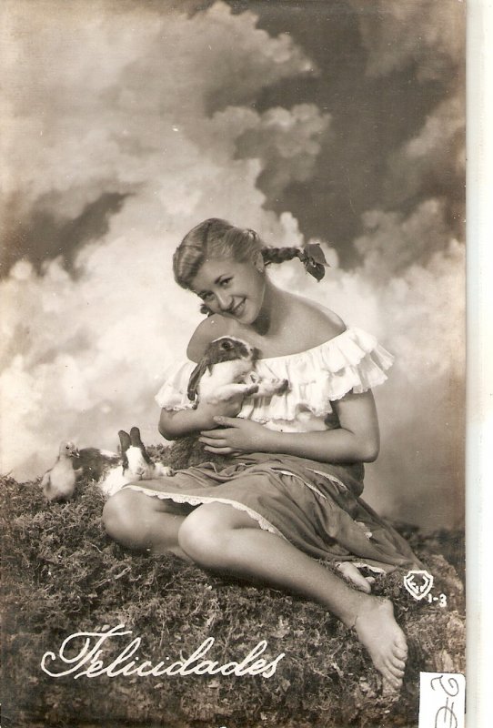 Pretty lady with rabbits in the field Nice vintage Spanish postcard