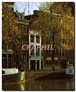Modern Postcard Holland Amsterdam Singel with the smallest house in Amsterdam