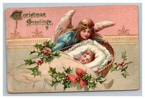 Vintage 1908 Tuck's Christmas Postcard Angel Visiting a Baby in Crib Mistletoe
