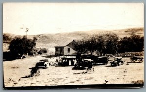 Postcard RPPC c1910s Western? United States Group Gathering Old Cars Tower