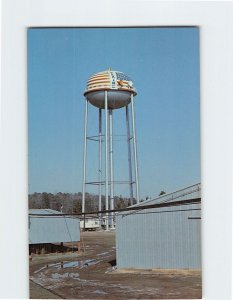 Postcard Water Tank surrounded by peanut warehouses, Plains, Georgia