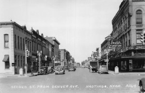 J74/ Hastings Nebraska RPPC Postcard c30-50s Street Scene Stores 393