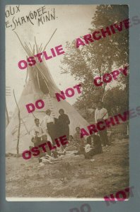 Shakopee MINNESOTA RPPC 1912 SIOUX INDIAN CAMP Teepee Indians FAMILY Rifle MN