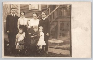 RPPC Edwardian Family Children with Toys Baby Doll  Bicycle Bike Postcard E29
