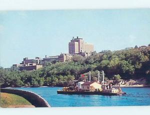 Pre-1980 HOSPITAL BEHIND FLOATING BARGE WITH BUILDING ON DECK Rochester MN d5697