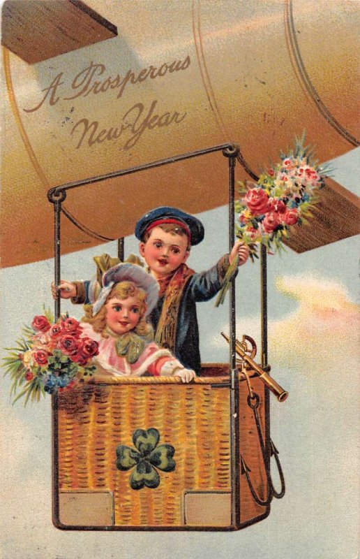 New Year Greetings Children in Zeppelin Airship PFB Postcard AA15244