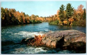 Rugged Rocks and a Rapid River amid Autumn Colorama - Nova Scotia, Canada