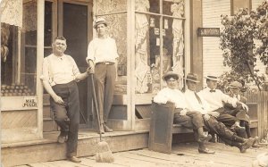 H98/ Lisbon Ohio RPPC Postcard c1910 Steam Laundry Store Men Bench  81
