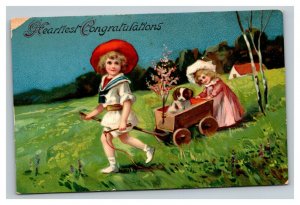 Vintage 1910's Postcard Cute Girl Pulls Wagon with Puppy Pink Flowers in Country