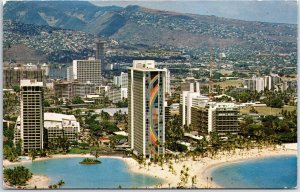 VINTAGE POSTCARD THE HILTON HOTEL RAINBOW TOWER ON WAIKIKI BEACH HAWAII c. '60s