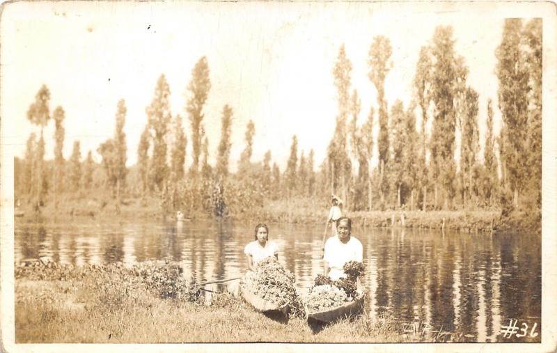 Mexico~Young Ladies posing in Wooden Canoes loaded w Flowers?~40s RPPC-Postcard