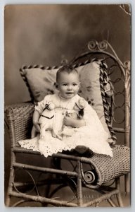 Fremont NE RPPC Darling Baby Theda Wicker Chair With Doll Toy Horse Postcard A49