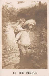 Child Carrying Another Child Across the Water Real Photo Unused 