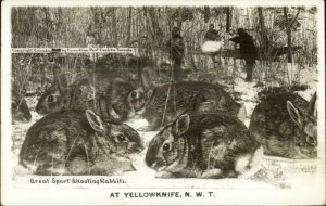Yellowknife Northwest Territory NWT Rabbit Hunting Exaggeration RPPC Postcard