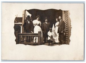 1910 Family On Porch Child Flag Patriotic Terre Haute IN RPPC Photo Postcard