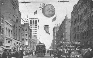 RIVERSIDE AVENUE SPOKANE WASHINGTON KING APPLE JUBILEE TROLLEY POSTCARD 1911