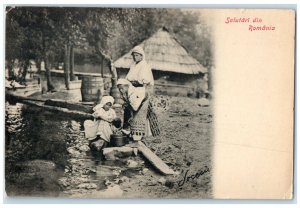 c1905 Women Getting Water From The River Greetings from Romania Antique Postcard