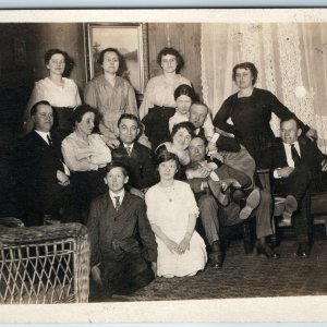 c1910s Family Group Photo RPPC House Interior Men Women Real Photo Postcard A213