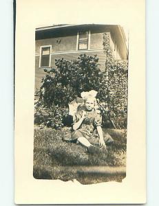 Pre-1918 rppc PRETTY GIRL WITH BOW IN HAIR HOLDING UMBRELLA r5985