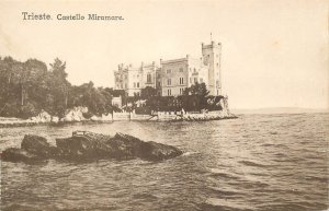 Italy Trieste Miramare castle tower and coast cliffs