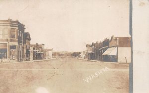 J62/ Washta Iowa RPPC Postcard c1910 Main Street Stores Bank  107