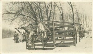 C-1910 hunting freezing jack rabbits for shipment RPPC Photo Postcard 22-3173