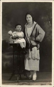 Japanese American? Woman in Studio Child Doll c1920 Real Photo Postcard