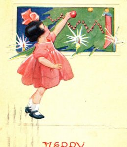 C. 1910 Adorable Girl Decorating Christmas Tree Ornaments Vintage Postcard P215