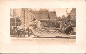 Real Photo Postcard Parade Float Outside Thomas Barbano Hot & Cold Baths