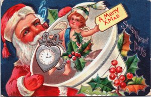 A Merry Christmas Santa Claus With Angel Embossed Vintage Postcard C106