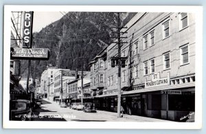 Juneau Alaska AK Postcard RPPC Photo Franklin Street Clothing Gastineau Hotel