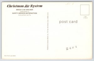 Transportation~Christman Air System Plane~Beech C-99 @ Night~1960s Postcard