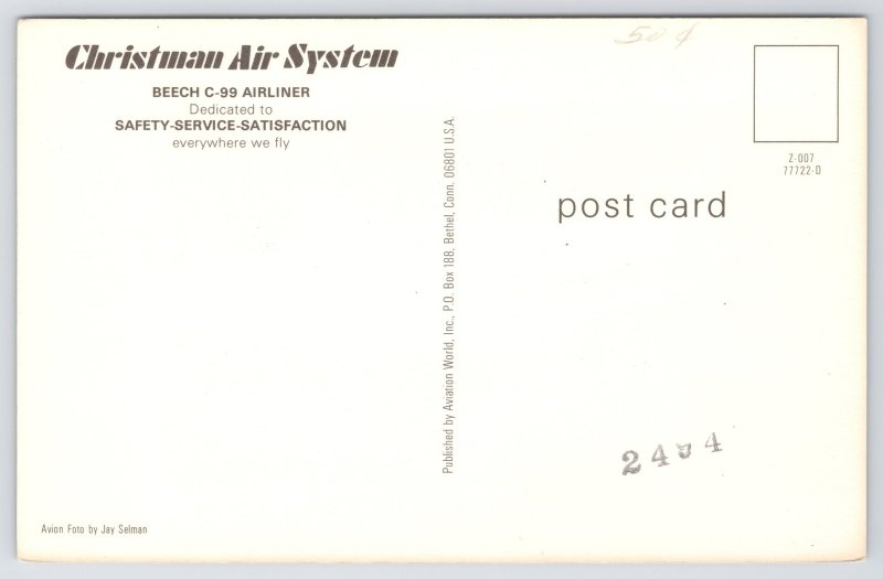 Transportation~Christman Air System Plane~Beech C-99 @ Night~1960s Postcard