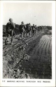 WWII Okinawa Japan ?? Marines Move Through Rice Paddies Real Photo Postcard