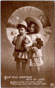 RPPC New Year GREETINGS CUTE KIDS with Good Luck Symbols   c1910s  UK  Postcard