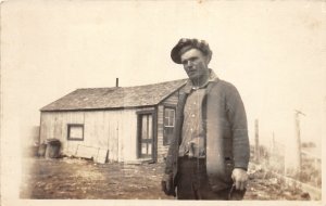 H40/ Martinsdale Montana RPPC Postcard c1920 Man on Claim Shack Home