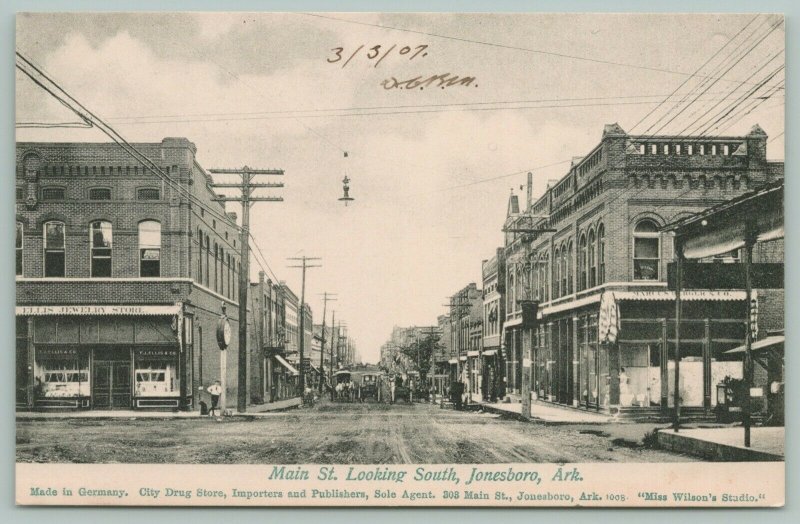 Jonesboro AR~Berger Dry Goods~Ellis Jewelry~Man Agin' Street Clock~Main St~c1908 