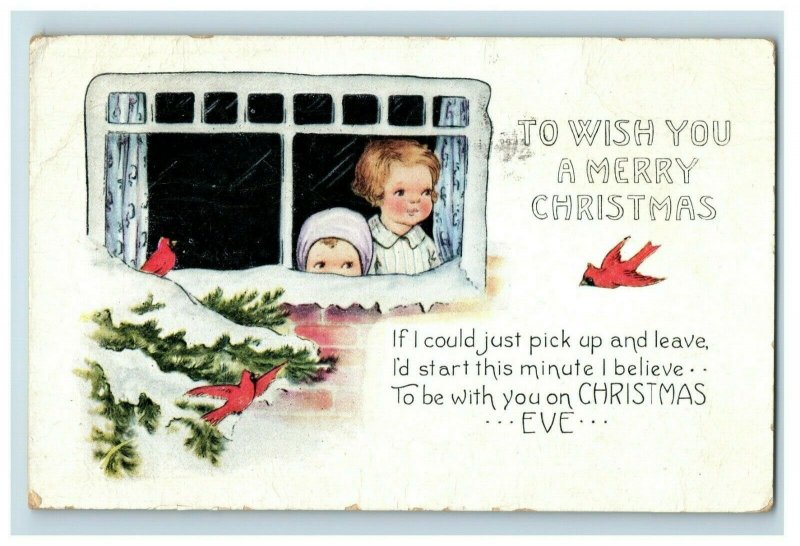 1910 Cute Kids Christmas Snowy Window Postcard P92
